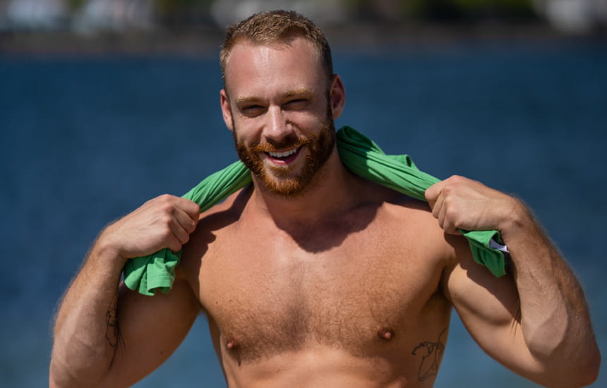Bearded hottie Brogan strokes his pierced dick in his Sean Cody debut